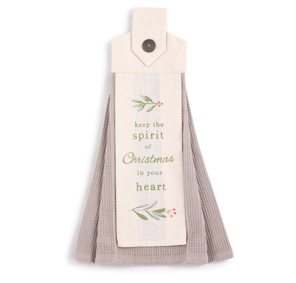 Tea towel that says keep the spirit of christmas in your heart